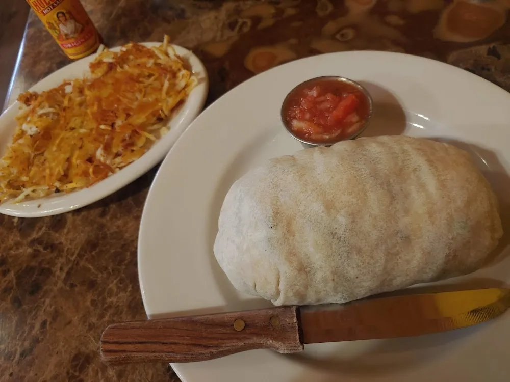 Vegetarian Breakfast Burrito and Requested Well Done Hash Browns